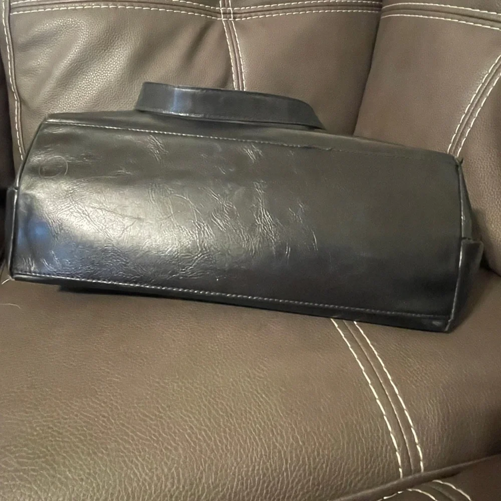 Franklin Covey Black laptop bag/purse.